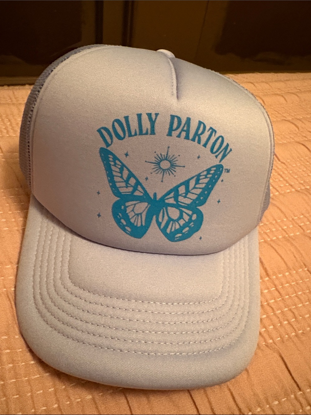 Dolly Parton Light Blue Trucker Hat with Teal Butterfly